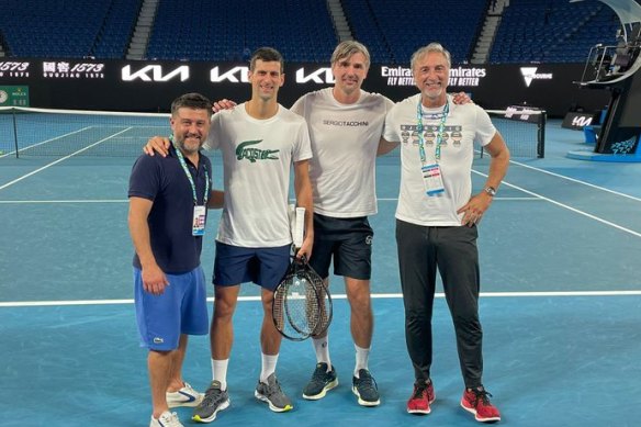 Novak Djokovic at Rod Laver Arena on Monday night after his court win with his team.