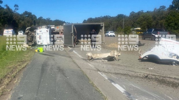The semi-trailer blocks the M1 after the crash about 2pm.