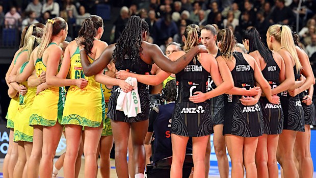 Australia and New Zealand huddle following game four in the Constellation Cup series.