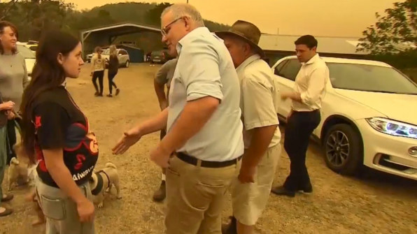 Zoey McDermott refuses to shake Scott Morrison's hand during his visit to the bushfire ravaged town of Cobargo.
