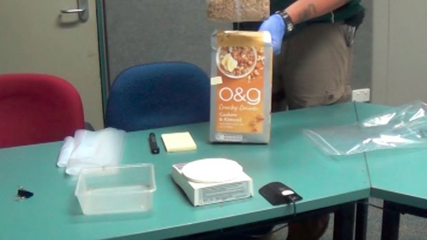 Police allege they found dangerous drugs hidden inside some granola. 