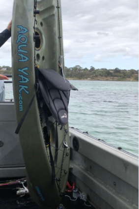 Three fishing rods were attached to the khaki-coloured Aqua Yak kayak.