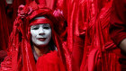 Members of Red Brigade march from Oxford Circus to Piccadilly Circus in London last Wednesday.