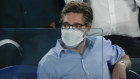 Robin Bishop (pictured at the Australian Open Men’s Final) donated $22,000 to the Liberals. 