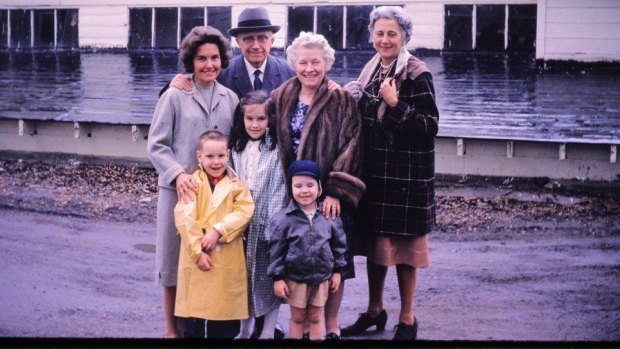 Howard (in yellow coat) with mum Susan, brother Peter, sister Susie and relatives on his mother’s side.