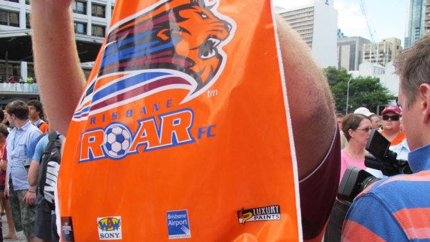 As sea of orange sweeps through Brisbane as Roar fans turn out to see their heroes.