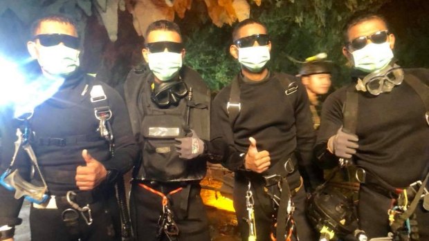 Three Thai Navy SEALs and a Thai doctor stayed with the boys overnight and were the last people out of the cave.