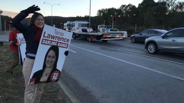 Labor Darling Range candidate Tania Lawrence braves a cold morning during the campaign.