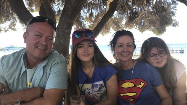 Lisa Gregory with her husband Gary and two daughters Cleo and Baylee at the MND WA annual charity skydive.