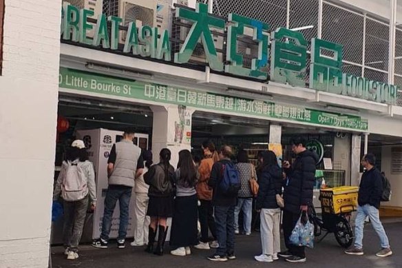 Queues outside one of Flying Turtle’s automatic drink machines in Melbourne.