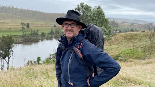 Author Simon Cleary on the Upper Brisbane River, 2022. He recounts the 27-day journey walking the Brisbane River in his book Everything Is Water (UQP).