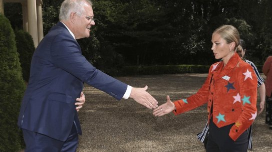 Grace Tame and Scott Morrison.