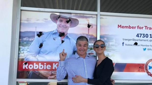 Robbie Katter and his wife Daisy show off the damage done at his Mount Isa electorate office on Thursday night. 
