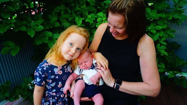 US grandmother Lisa pictured with her Queensland grandchildren Rosie and Atty in March 2019.