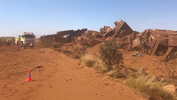 A derailment in the Pilbara helped derail BHP's first half result.