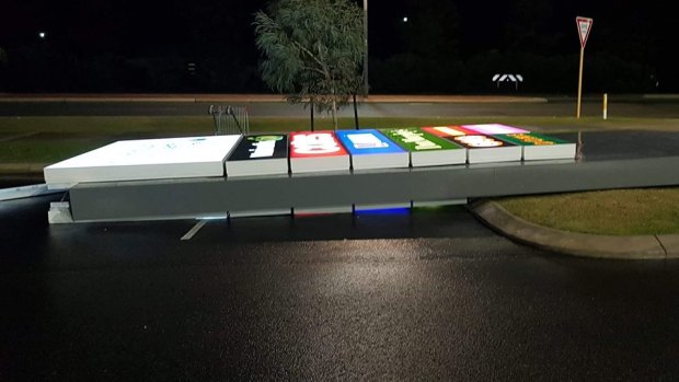 The storm blew over a neon sign in Perth's north. 