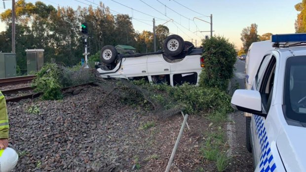 A vehicle rolled onto railway tracks on Sunday evening, blocking the Sydney to Newcastle line for an hour. 