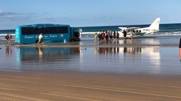 The bus was bogged overnight before a large rescue operation got underway.
