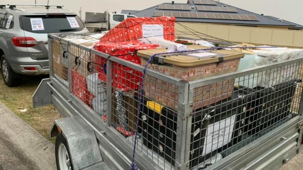 A trailer is loaded up with hampers before hitting the road.