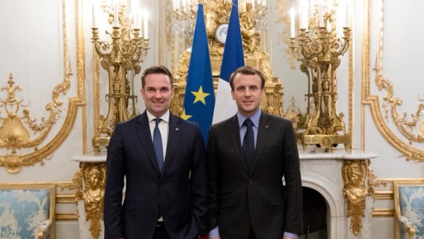 Brendan Berne, pictured with President Emmanuel Macron, finished his three-year post as ambassador earlier this month.