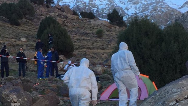 A forensic team attends the site where two Scandinavian women were found near Imlil in the High Atlas mountains, Morocco.