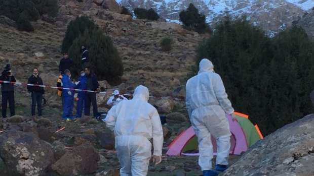 A forensic team attends the site where two Scandinavian women were found near Imlil in the High Atlas mountains, Morocco.