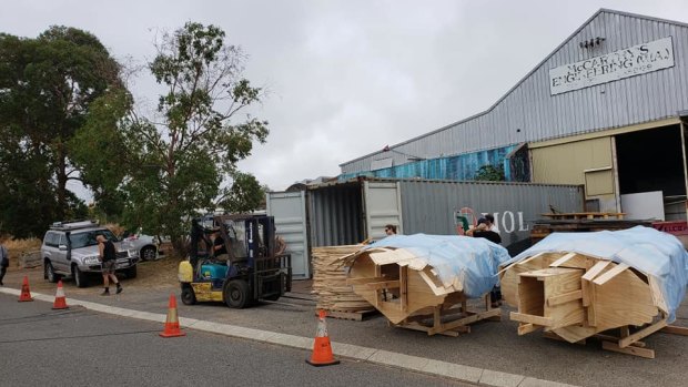 The swan effigy being prepared to leave The Nest warehouse in Fremantle for the 2020 festival.