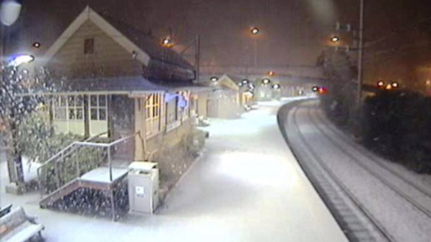 Snow blankets Katoomba train station on Tuesday morning.