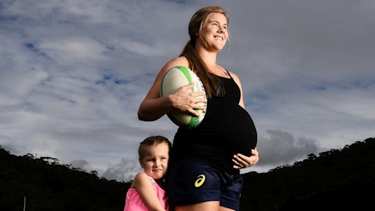 Nicole Beck, with 4 year old daughter Sophie. Rugby first sport to nut out policy on what to do with elite female athletes who have children. 