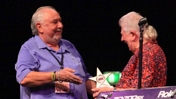Some fans have called for Bluesfest founder Peter Noble, pictured with legendary bluesman John Mayall, to step down.