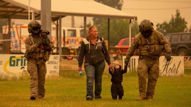 Australian Army's 5th Aviation Regiment CH-47 Chinook helicopters evacuate people from Omeo. 