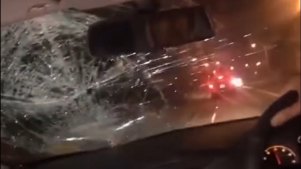 A screengrab from a video posted to social media showing a car hitting a cyclist.