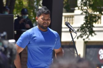 Thanush Selvarasa speaking outside the Park Hotel shortly after his release from immigration detention in January.