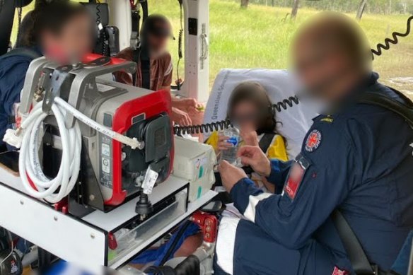 A father and his primary school aged daughter clung to a tree for two days after their car was swept away in floodwaters in the Gympie region. 