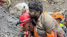 Two workers have been pulled alive from a hydropower tunnel.