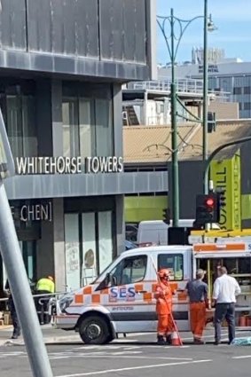SES and police secure the area below the Whitehorse Towers on December 30.