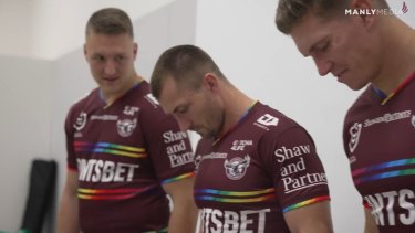 Players model the new jersey.
