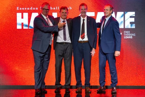 The Daniher brothers celebrate (from left): Anthony, Chris, Neale and Terry.