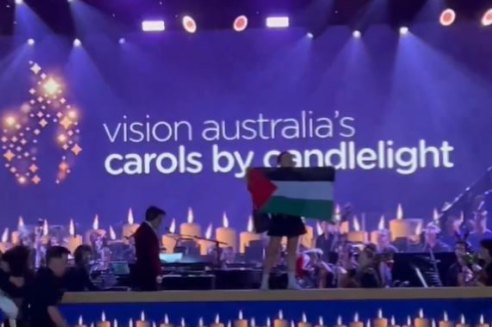 Protesters stormed Melbourne’s Carols by Candlelight stage mid-performance.