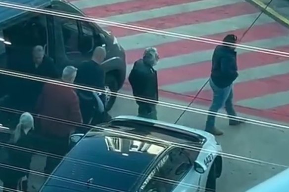 Perry Kouroumblis, second from right with white beard, in Rome preparing to depart Italy for Australia.