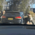 A man has allegedly carjacked a woman on a busy motorway in Sydney’s west with two kids in tow.