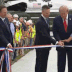US President Donald Trump was drowned out by the noise from helicopters when he showed off his new White House helipad.