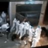 Shanghai’s feared hazmat-clad health workers videoed dragging people from homes