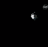 An uncrewed Starliner capsule approaches the ISS.