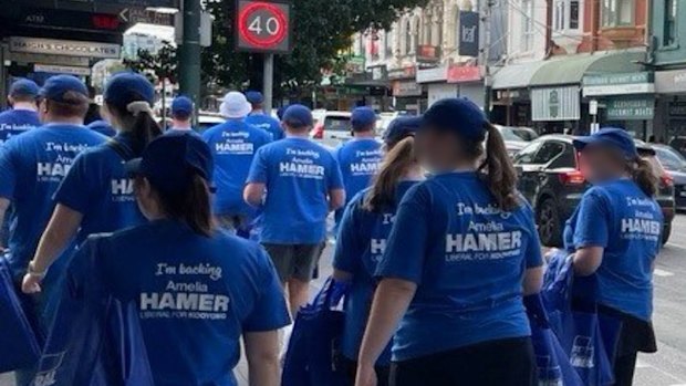 Brethren members supporting the Liberal candidate head to a polling booth in Kooyong.
