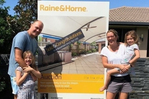 Jess and Jackie Morecroft and their kids outside the home they bought in Mermaid Beach on the Gold Coast in 2018.