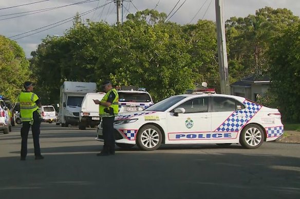 Officers at the scene of the stabbing last year.