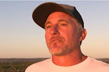 Shannan Dunn thought nothing of paddling into bloodied waters after turning up to Glenfield Beach for a surf.