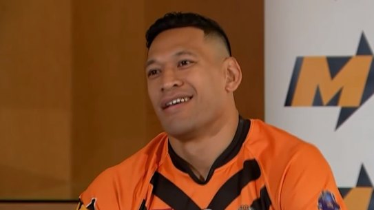 Israel Folau, wearing a Southport Tigers jersey, said on Friday he was excited to return to the “grassroots level”.