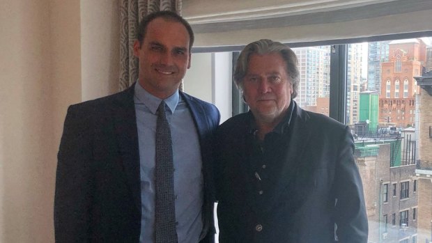 Brazilian congressman Eduardo Bolsonaro, left, meets with former Trump chief strategist Steve Bannon in New York in the lead up to his father's presidential election win in 2018. 